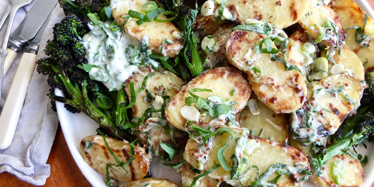 Grilled purple sprouting broccoli and new potato salad with wild garlic mayonnaise