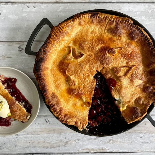 Skillet Cherry Pie with Clotted Cream and Pistachios