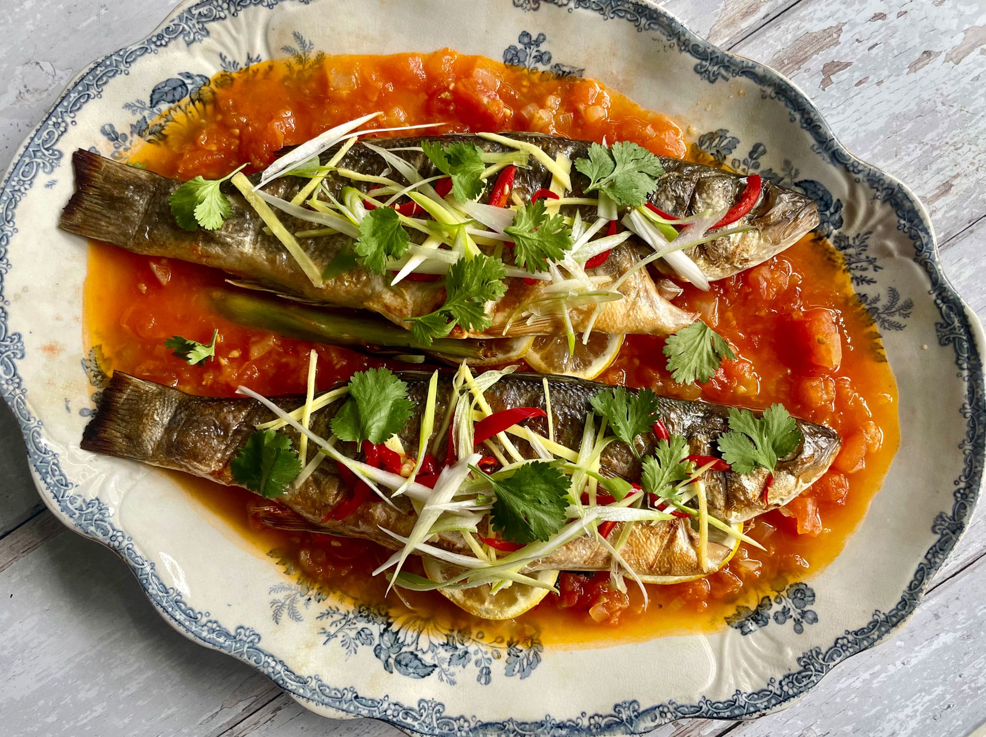 Herb-Stuffed Seabass with a Fresh Tomato and Ginger Sauce