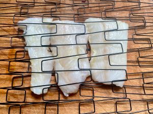 barbecueing fish in fish basket
