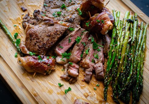 Rare steak with seasoned asparagus