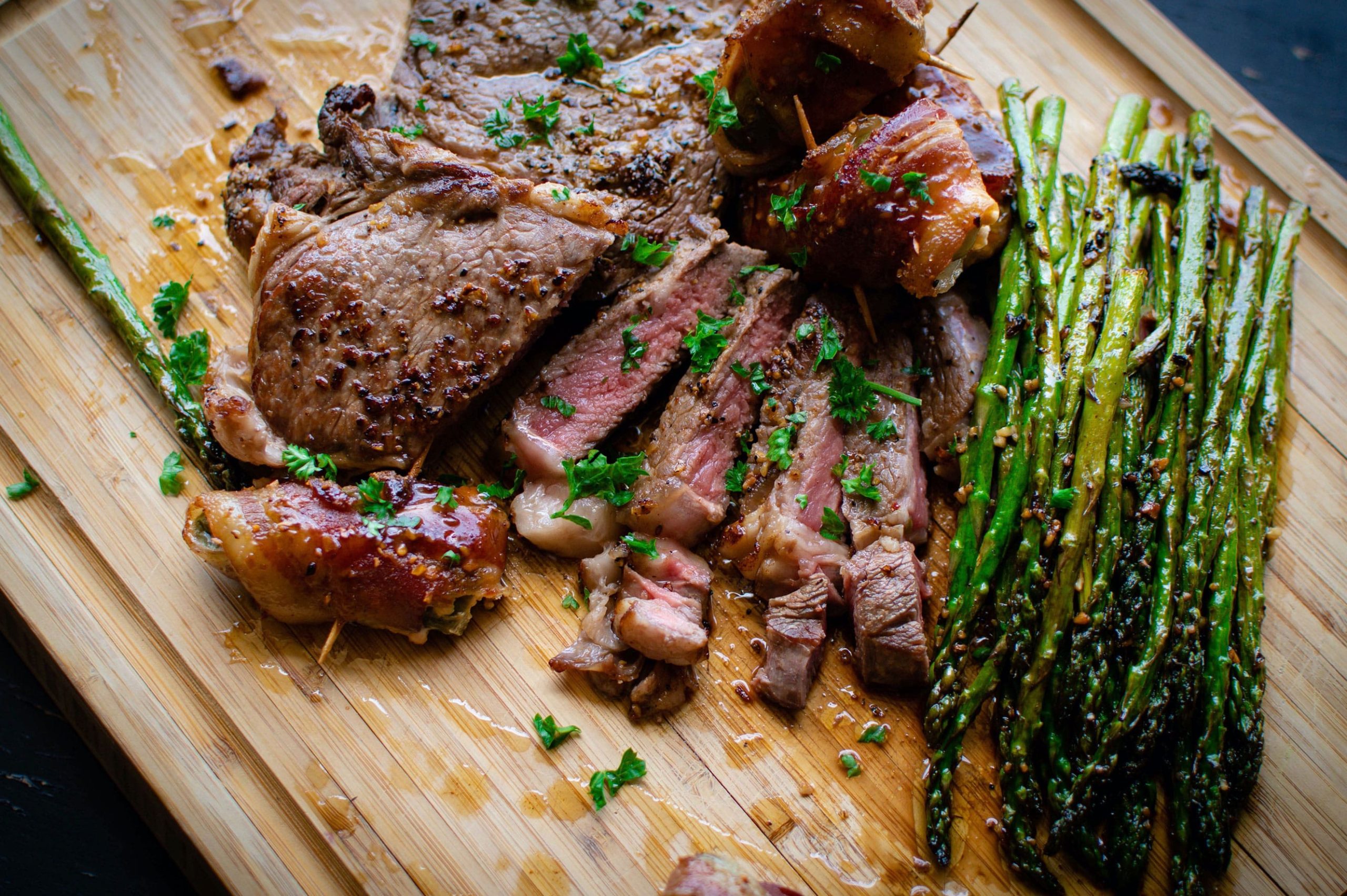 Rare steak with seasoned asparagus